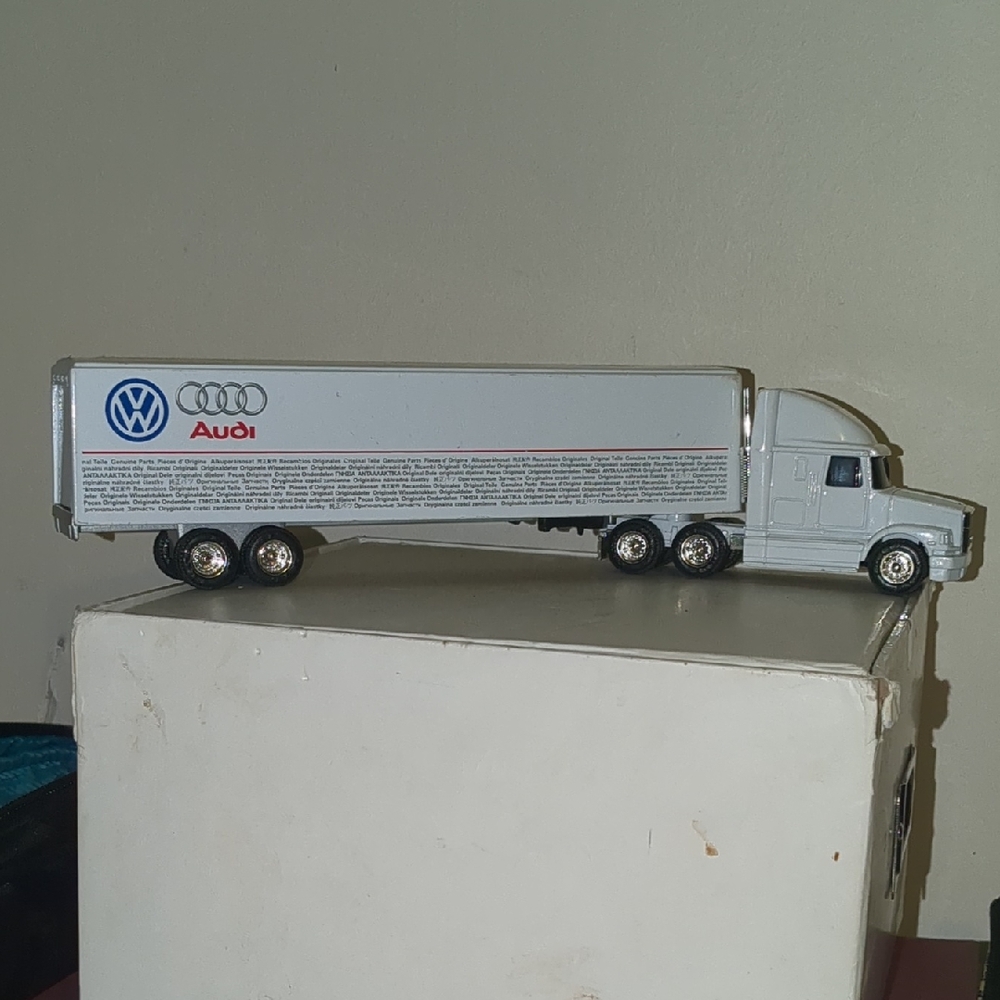 Audi and VW White Toy Truck